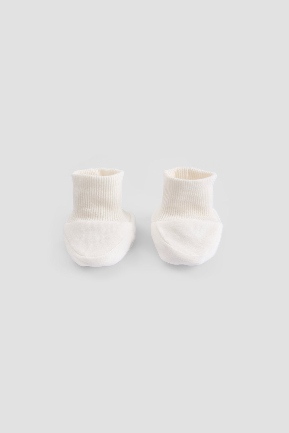 white organic cotton baby booties soft newborn socks back side