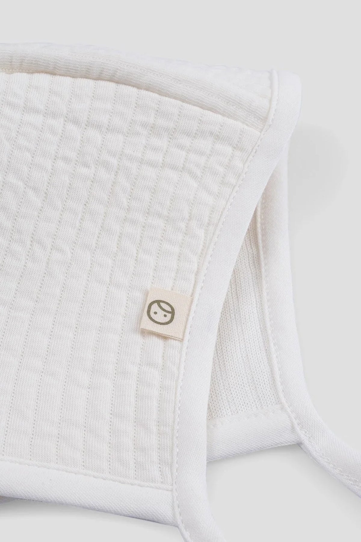 white ribbed baby bonnet organic cotton soft baby hat detail