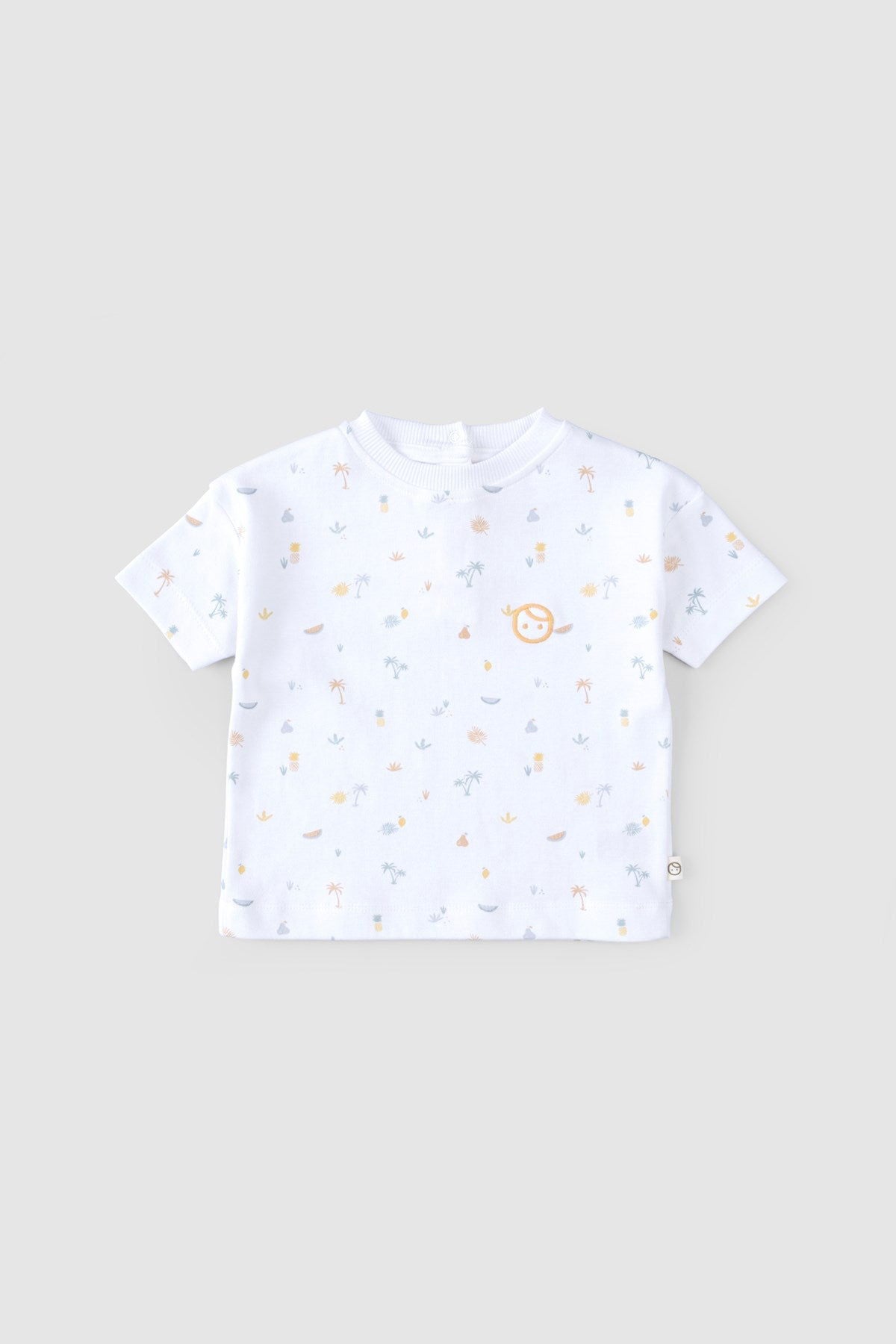 baby wearing organic cotton outfit picnic pattern
