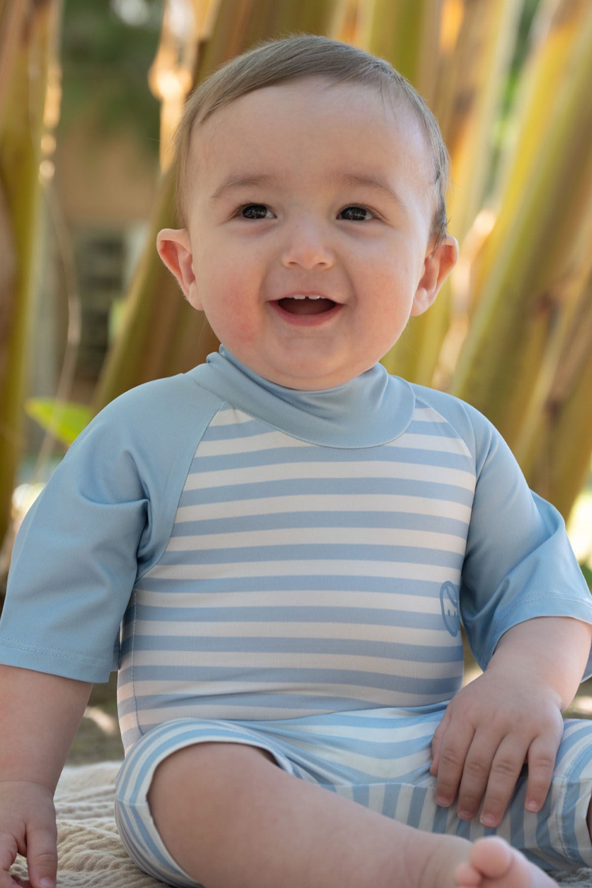 blue striped baby swimwear fabric detail