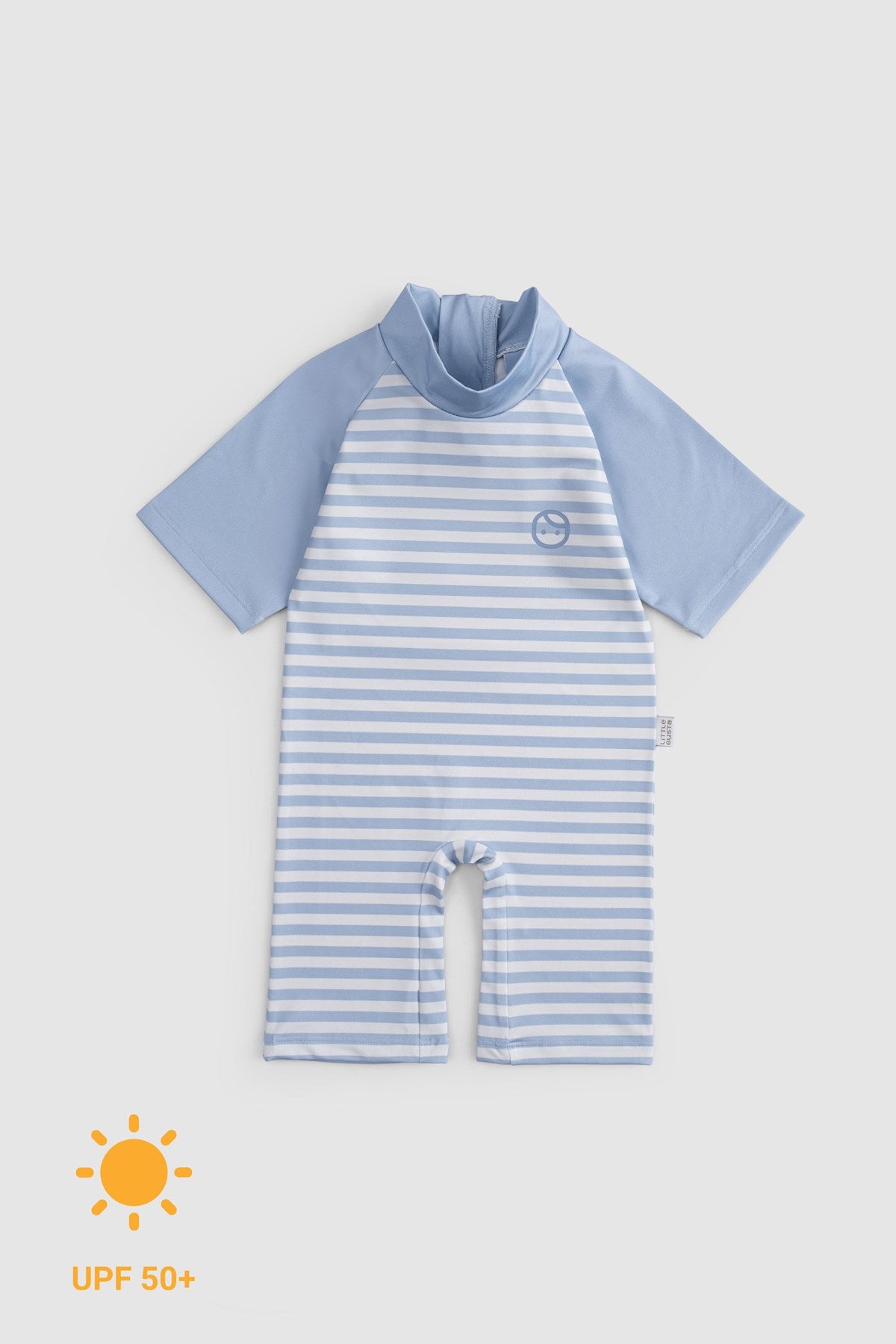 baby wearing uv protection sunsuit outdoor