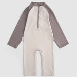 baby wearing brown swim shorts summer outfit