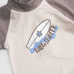 baby swim shorts brown dots back view