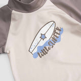 baby swim shorts brown dots back view